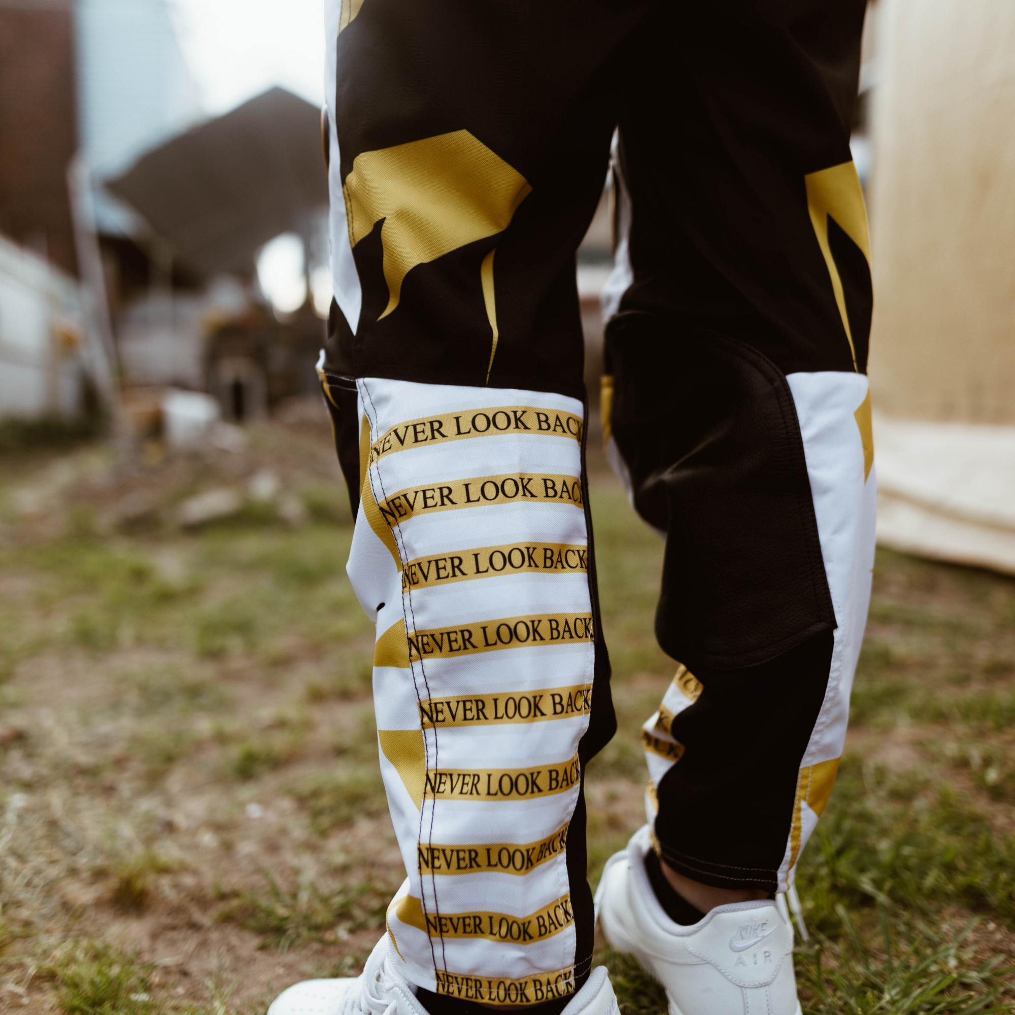 Yellow and white track pants online